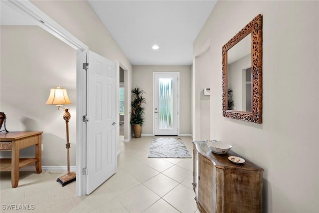 entrance foyer featuring light tile patterned flooring