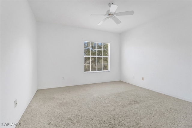 1040 Partridge Cir Unit 201, Naples, FL 34104 - empty room featuring carpet floors and ceiling fan