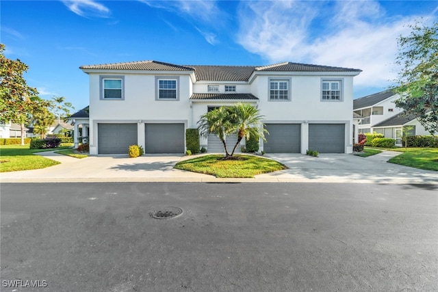 1040 Partridge Cir Unit 201, Naples, FL 34104 - mediterranean / spanish home with a garage