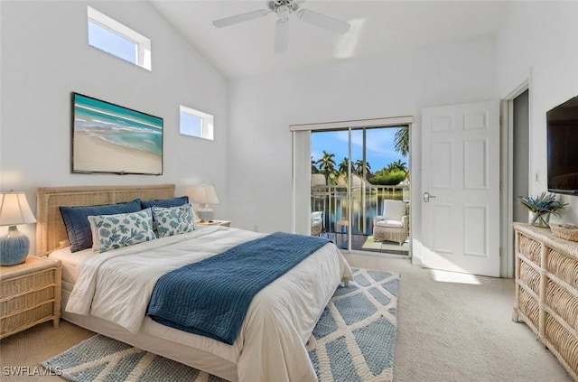 1040 Partridge Cir Unit 201, Naples, FL 34104 - carpeted bedroom featuring ceiling fan, access to outside, and high vaulted ceiling