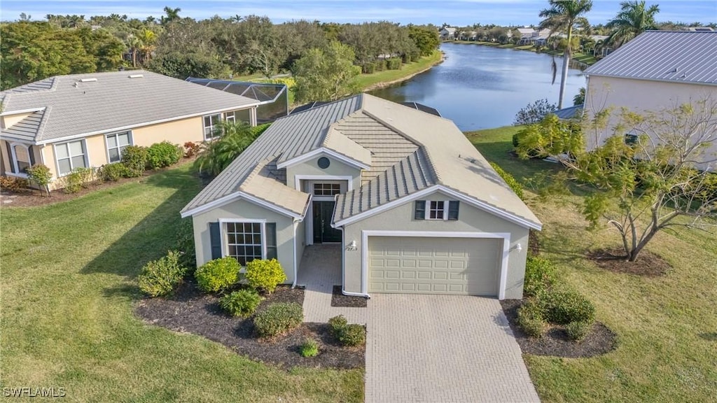 drone / aerial view featuring a water view