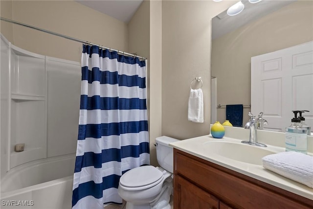 full bathroom featuring vanity, toilet, and shower / tub combo with curtain