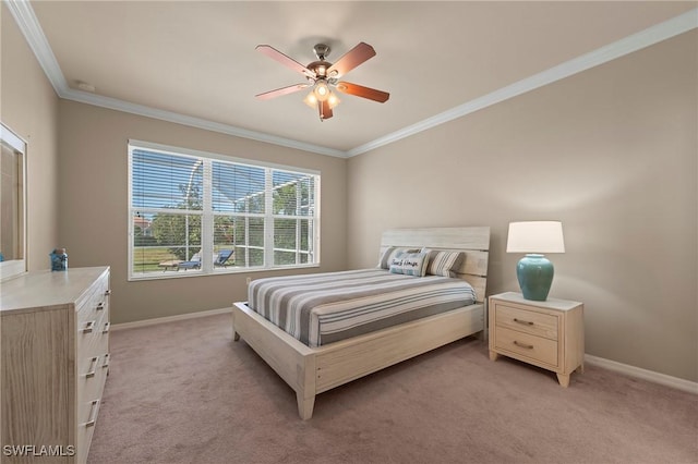 bedroom featuring ceiling fan, light colored carpet, and ornamental molding