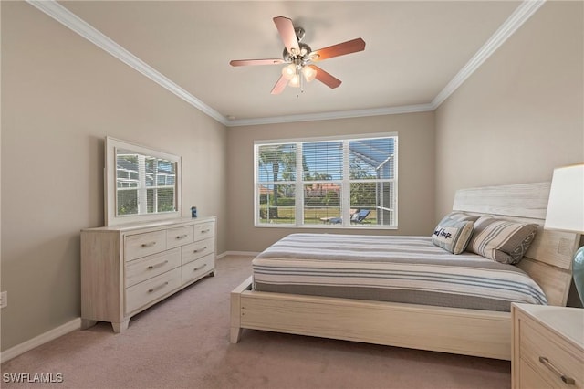 carpeted bedroom with crown molding and ceiling fan