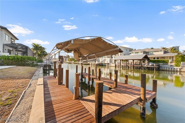 dock area featuring a water view