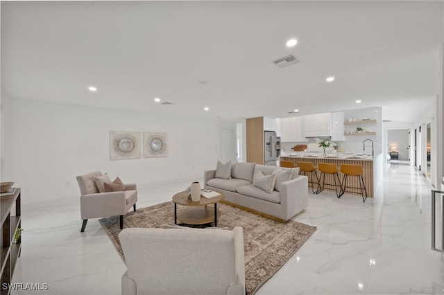 living room with sink