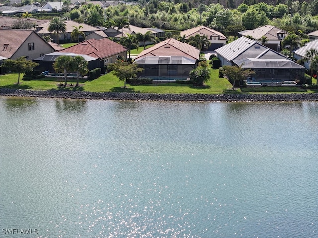 drone / aerial view with a water view