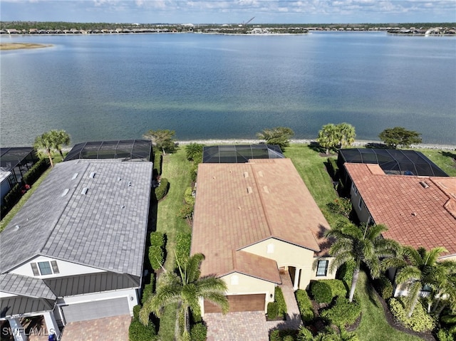 birds eye view of property featuring a water view