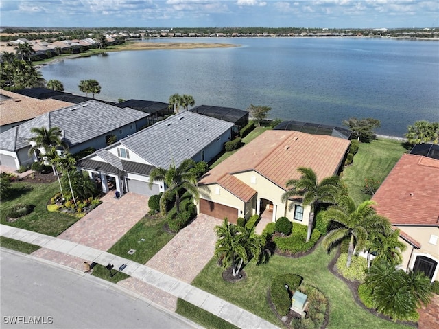 birds eye view of property featuring a water view