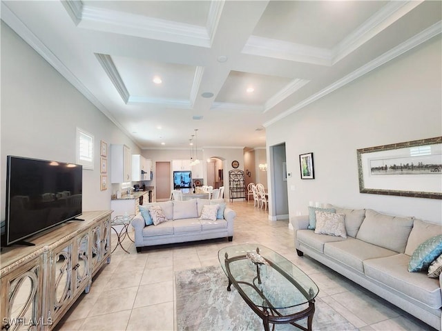 living room with coffered ceiling, light tile patterned floors, beam ceiling, and ornamental molding