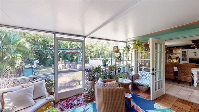 sunroom featuring french doors