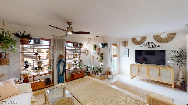 living room with ceiling fan