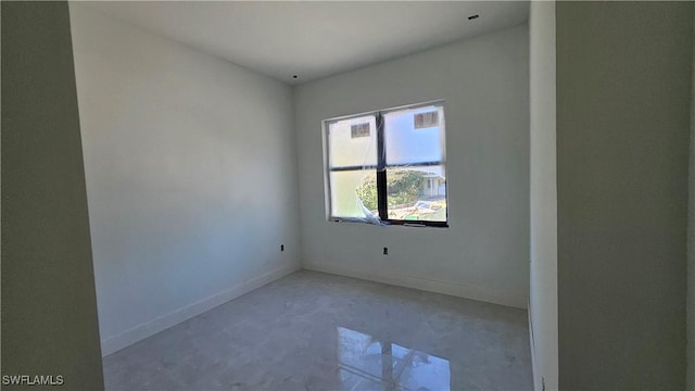 empty room featuring concrete floors