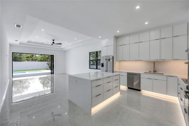 1312 Trail Terrace Dr, Naples, FL 34103 - kitchen with modern cabinets, a sink, stainless steel appliances, recessed lighting, and white cabinets