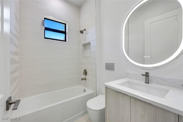 1312 Trail Terrace Dr, Naples, FL 34103 - bathroom featuring vanity, toilet, and washtub / shower combination