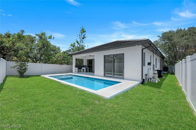 1312 Trail Terrace Dr, Naples, FL 34103 - rear view of property with stucco siding and a patio area