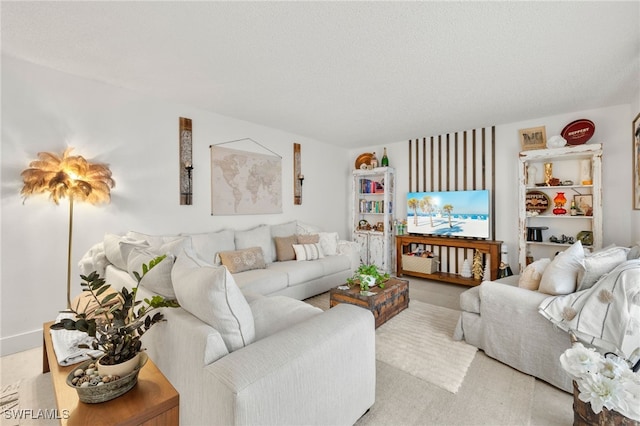 living room with light colored carpet and a textured ceiling