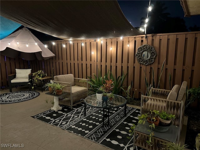 view of patio at twilight