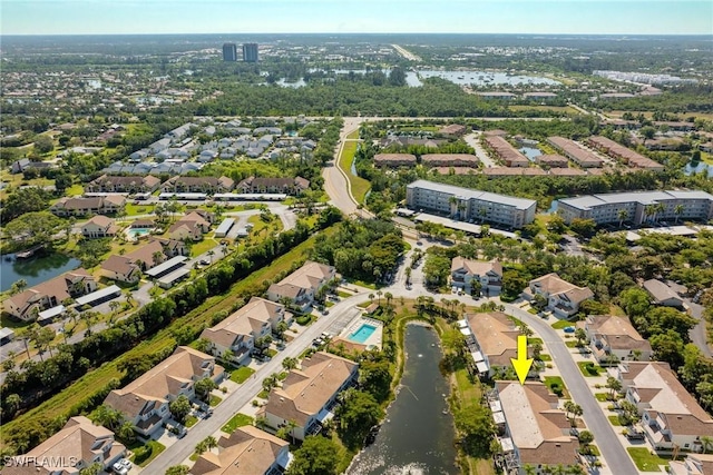 aerial view featuring a water view and a residential view