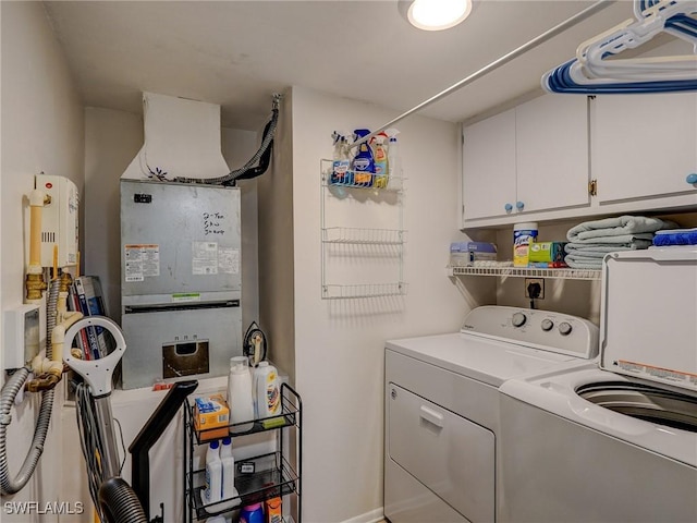 laundry area featuring cabinets and washer and dryer