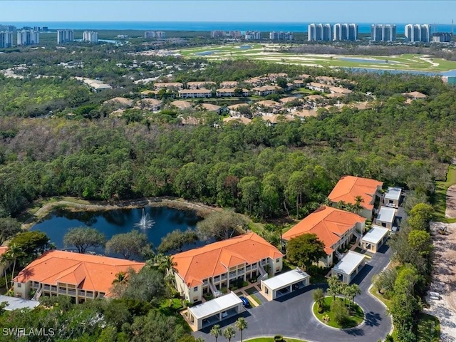 1045 Tarpon Cove Dr Unit 102, Naples, FL 34110 - drone / aerial view of a nearby body of water