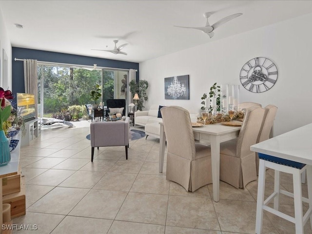1045 Tarpon Cove Dr Unit 102, Naples, FL 34110 - dining space featuring ceiling fan and light tile patterned flooring