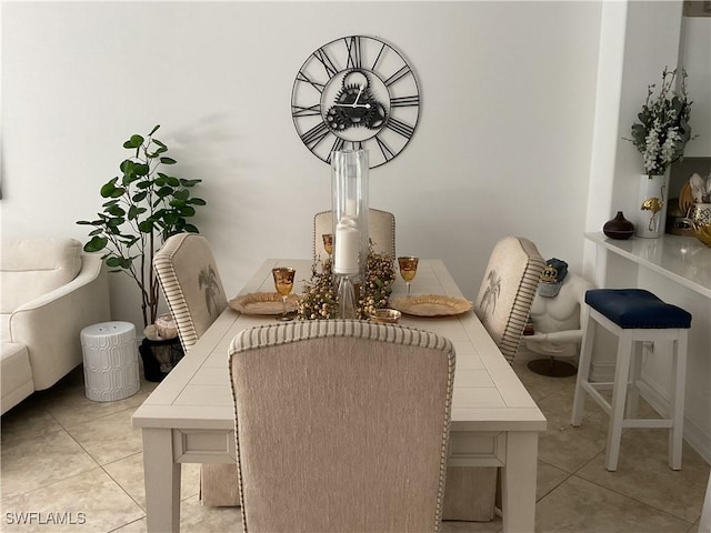 1045 Tarpon Cove Dr Unit 102, Naples, FL 34110 - dining area with tile patterned floors