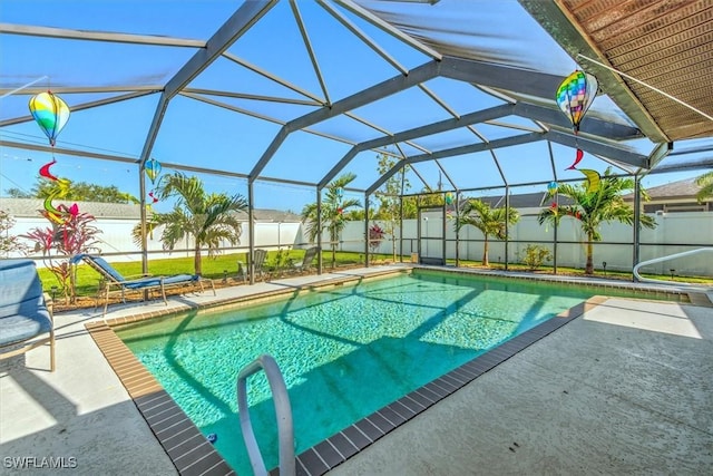 view of pool featuring a lanai and a patio