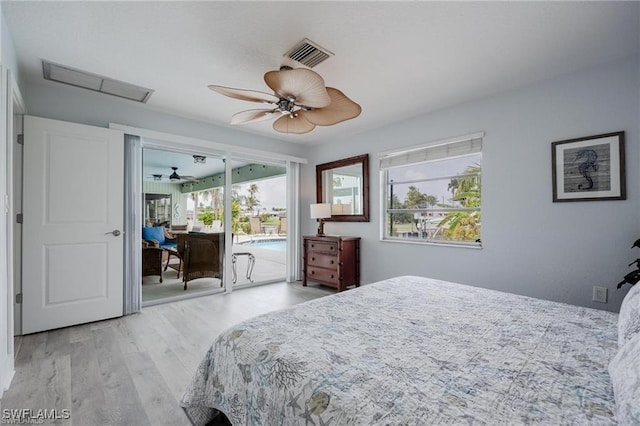 bedroom featuring access to exterior, light hardwood / wood-style floors, and ceiling fan