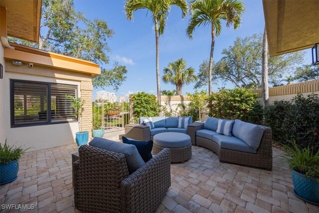 view of patio featuring a fenced backyard and an outdoor hangout area