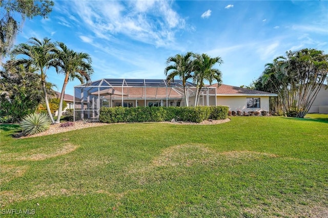 view of yard featuring a lanai