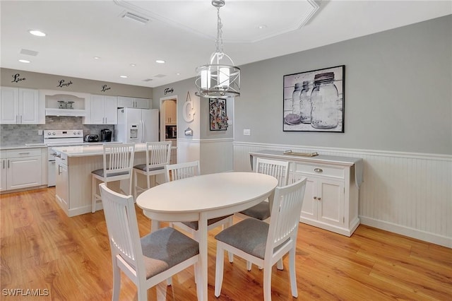 dining area featuring light hardwood / wood-style flooring