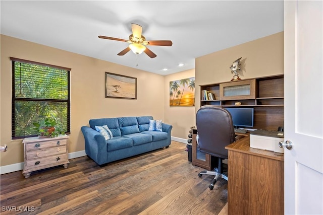 home office featuring ceiling fan and dark hardwood / wood-style flooring