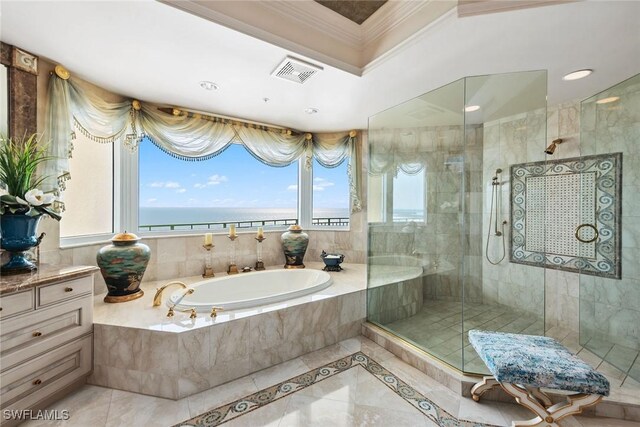 bathroom featuring crown molding, separate shower and tub, and a water view