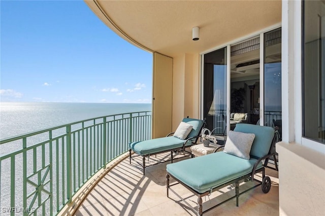 balcony featuring a water view