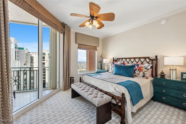 bedroom with ornamental molding, light colored carpet, access to exterior, and ceiling fan