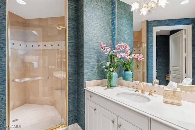 bathroom featuring vanity and walk in shower