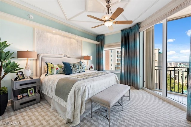 bedroom featuring ornamental molding, access to exterior, and ceiling fan