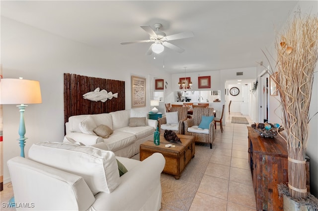 tiled living room with ceiling fan