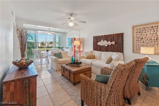 tiled living room featuring ceiling fan