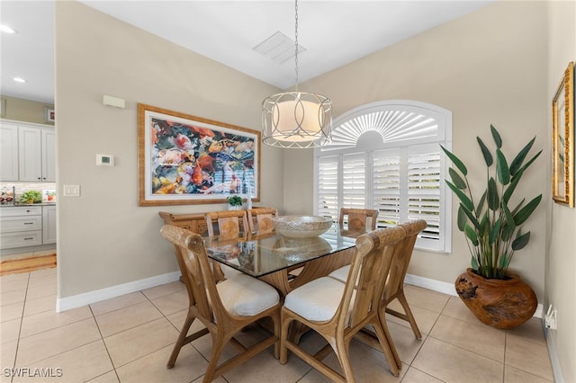 dining room featuring recessed lighting, baseboards, a chandelier, and light tile patterned flooring