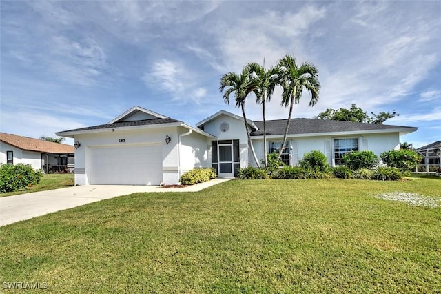 ranch-style home with a garage and a front lawn