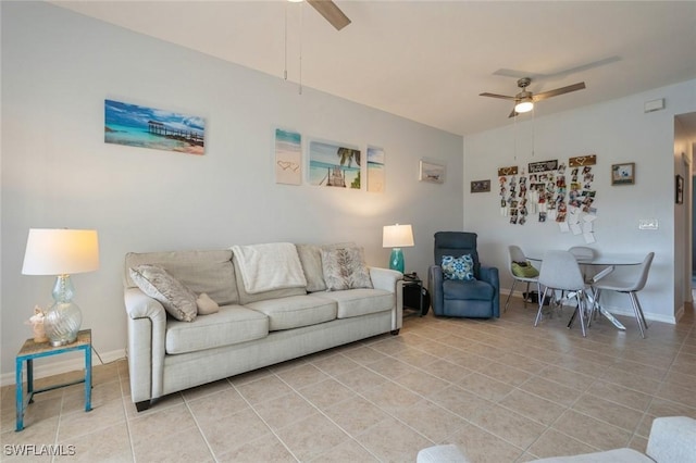 living room with light tile patterned floors and ceiling fan