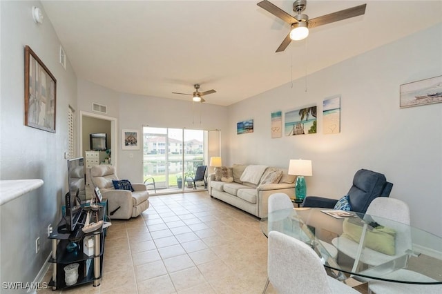 living room with light tile patterned floors and ceiling fan