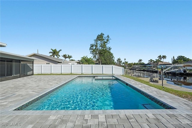 view of pool featuring a patio area, a fenced backyard, and a fenced in pool