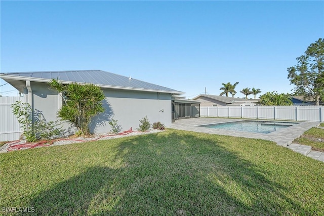 exterior space with a fenced in pool, a patio area, and fence