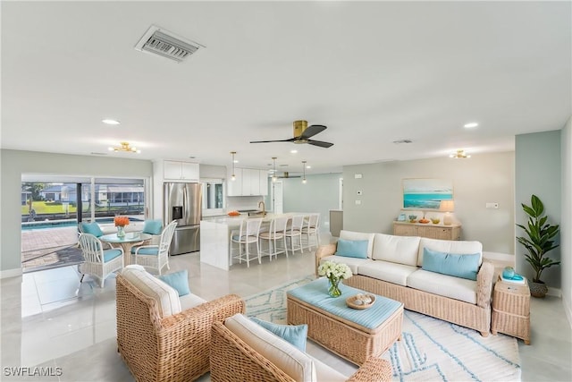 living room featuring recessed lighting, visible vents, ceiling fan, and light tile patterned flooring