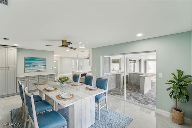 dining space featuring recessed lighting, visible vents, and light tile patterned flooring