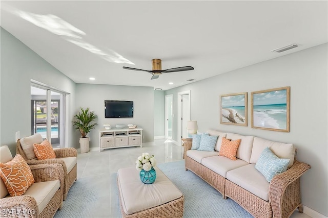 living area with baseboards, a ceiling fan, visible vents, and recessed lighting