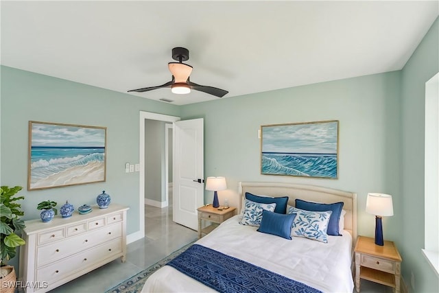 bedroom featuring baseboards and a ceiling fan